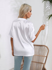 White satin collared shirt with short sleeves, button front, and a relaxed fit.