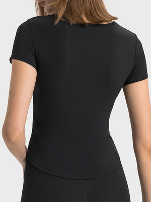Black ribbed active t-shirt with short sleeves and a notch neckline.