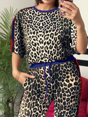 Leopard print loungewear set with blue trim and red stripe detail.