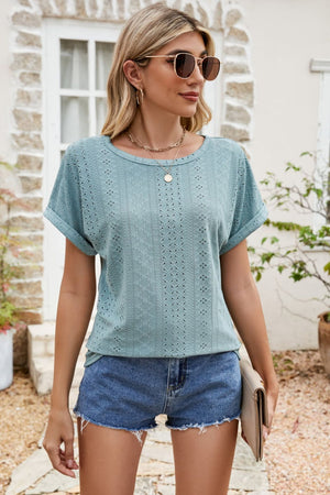 Teal perforated tee with crew neck and cuffed short sleeves.