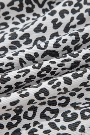 Leopard print denim skort with pockets in black and white cotton.