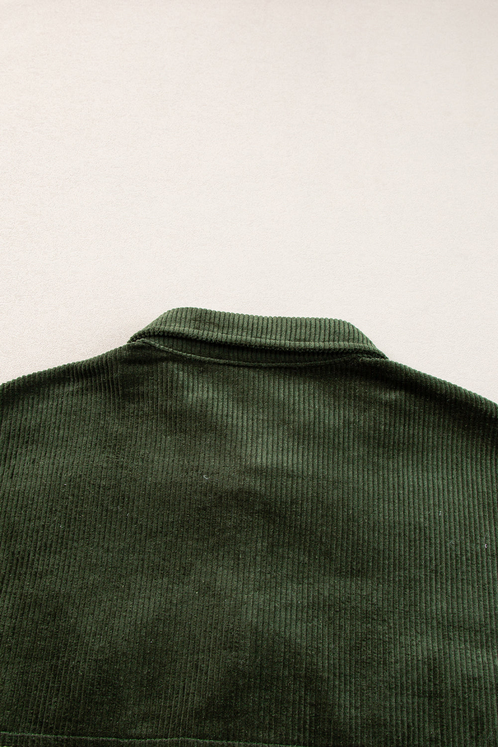 Black Forest corduroy overshirt with a collared neckline and yoke detail.
