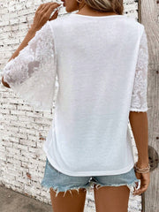 White tee with lace flared sleeves and a crew neck.