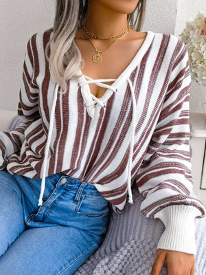 Lace-up stripe knit cropped pullover sweater in taupe and white with a V-neck and long sleeves.