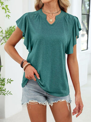 Dark green tee with ruffled sleeves and notched V-neck, styled with denim shorts.