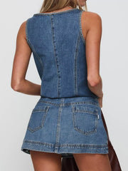 Blue denim tank top and skirt set with visible stitching and back pockets.