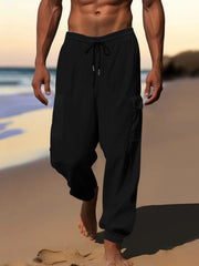Black waffle knit joggers with drawstring and cargo pockets.