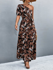 Tropical print one-shoulder maxi dress in black with balloon sleeves and a tie waist.