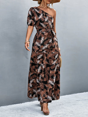Tropical print one-shoulder maxi dress in black with balloon sleeves and a tie waist.