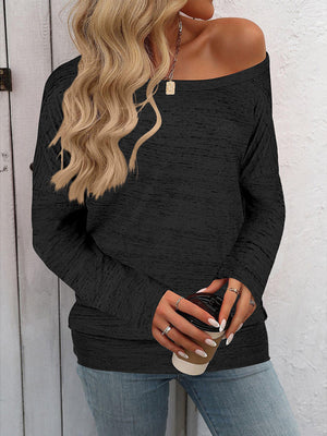 Black heathered knit off-the-shoulder sweater with long sleeves.