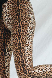Leopard print bell bottom trousers with a flared leg.