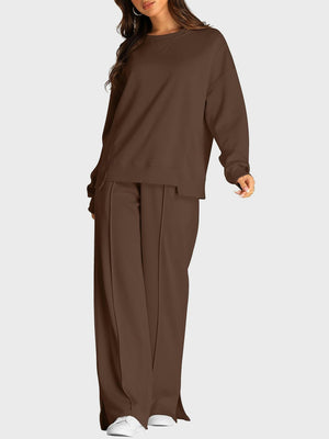 Brown seamed loungewear set with crewneck sweatshirt and slit-front wide-leg trousers.