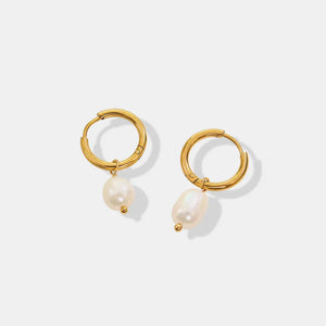 Gold hoop earrings with lustrous pearl drops and gold bead accents
