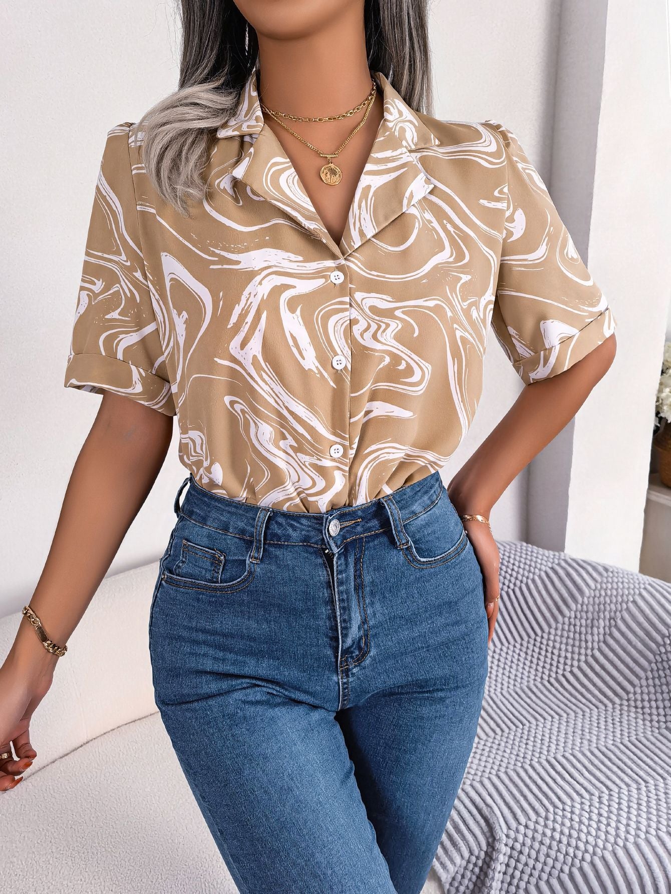 Khaki swirl print camp collar blouse with short sleeves.