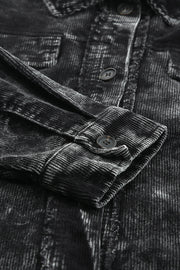 Black corduroy overshirt with faded wash detail, button cuff and chest pocket.
