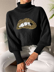 Black turtleneck sweater with sequin lip and leopard print detail