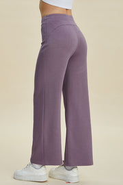 Soft drape wide leg lounge pants in Moonlit Mauve with a high waist and flared hem.