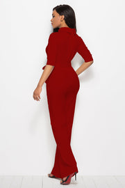 Deep Red high-neck belted palazzo jumpsuit with 3/4 sleeves and wide legs.