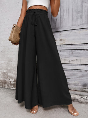 Black ruffled waistline palazzo trousers with drawstring and wide legs.