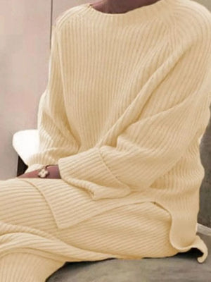 Apricot ribbed knit sweater and pants set with crew neck and long sleeves.