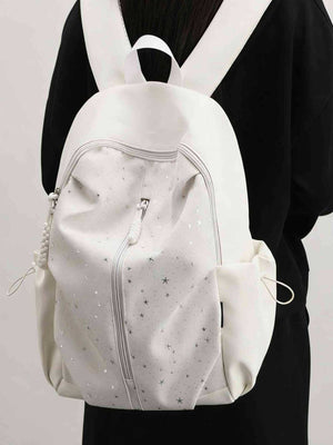 Gray/white nylon school backpack with all-over star pattern and braided zipper pull.