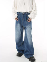 Men's wide leg denim jeans in blue wash with a relaxed fit.