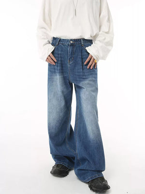 Men's wide leg denim jeans in blue wash with a relaxed fit.
