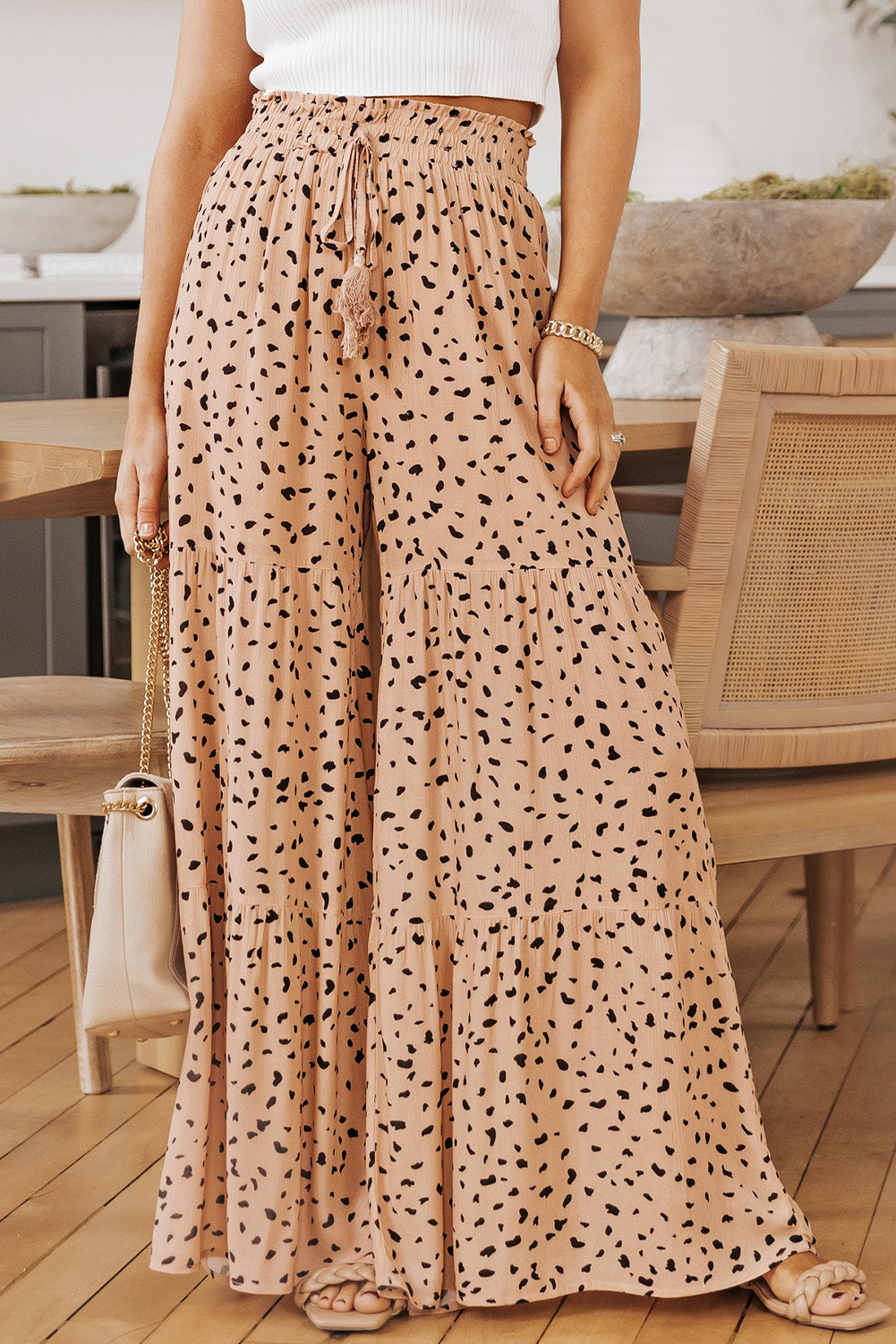 Dalmatian print palazzo trousers in watermelon pink with tiered ruffle hem and drawstring waist.