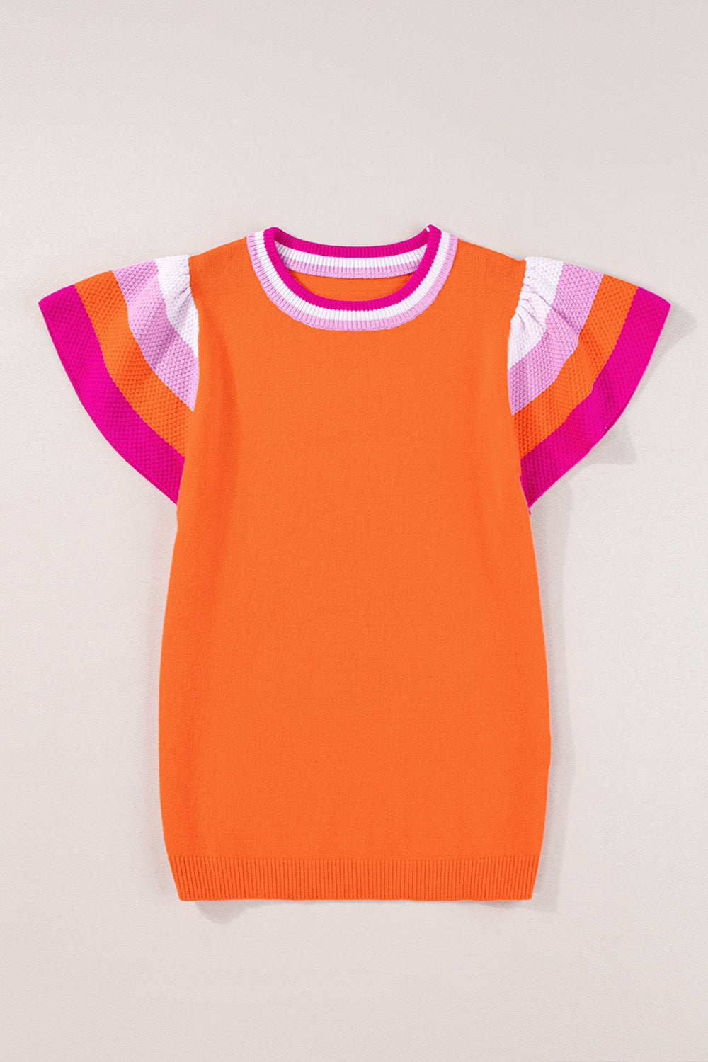 Orange knit blouse with flutter sleeves and colorblock trim on neckline and sleeves.