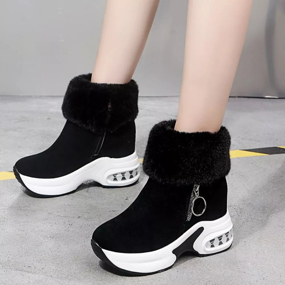 Black plush ankle boots with side zipper, fur trim, and air cushion sole.