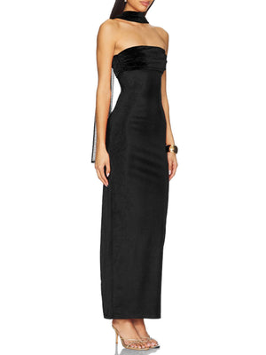 Black ruched strapless maxi dress with velvet bodice and sheer side panels.