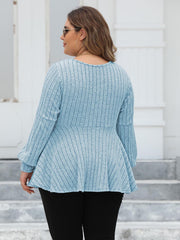 Pastel Blue ribbed peplum knit top with blouson sleeves and a flared hem.