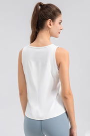 White performance tank top with curved back panel detail.