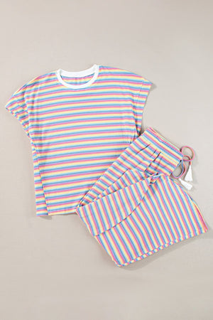 Rainbow stripe cotton culotte jumpsuit with drawstring waist and tassels.
