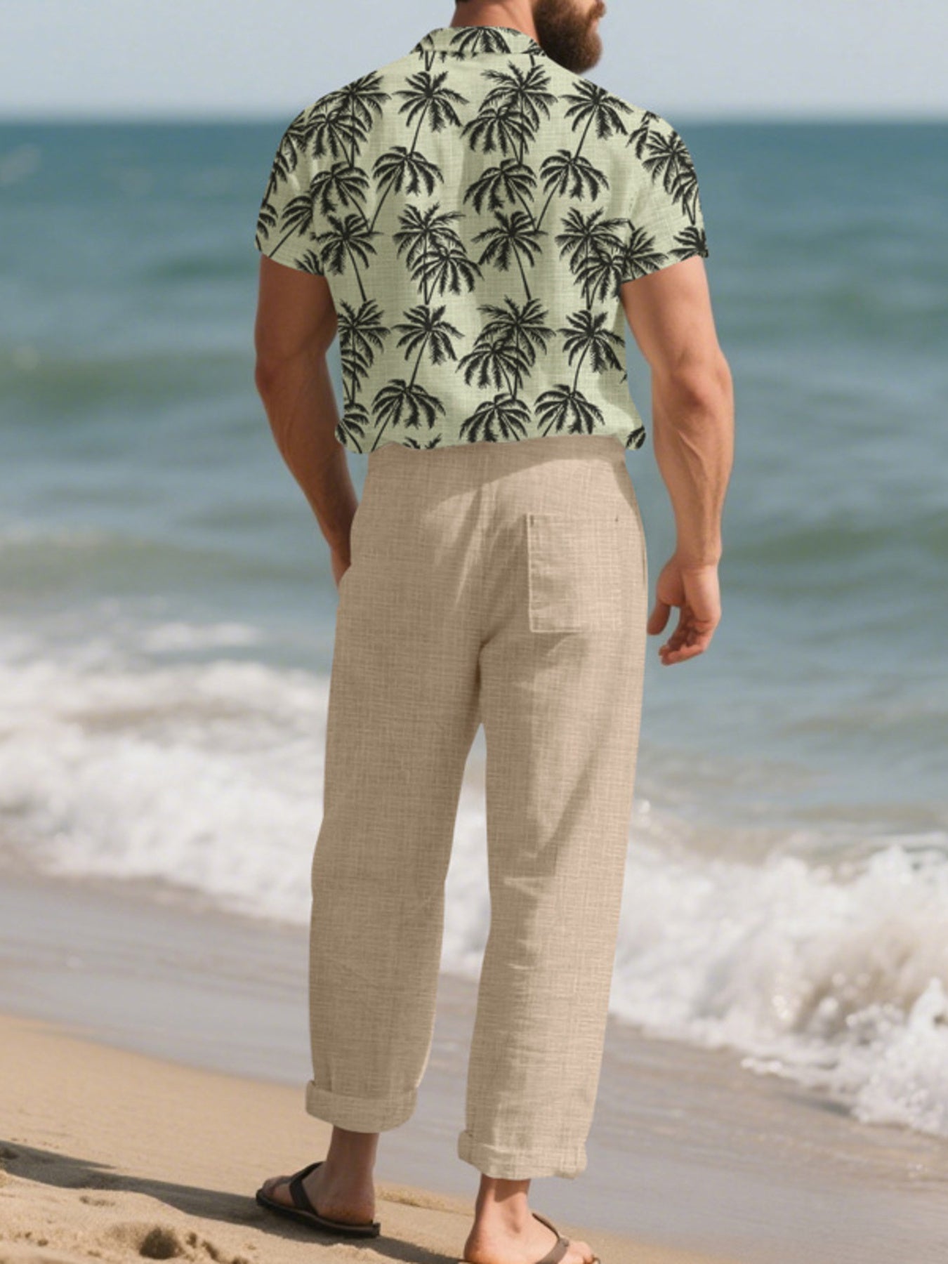 Men's relaxed fit linen pants in beige with a back pocket, cuffed hems.