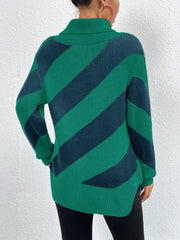 Diagonal stripe turtleneck sweater in dark green and navy acrylic knit.