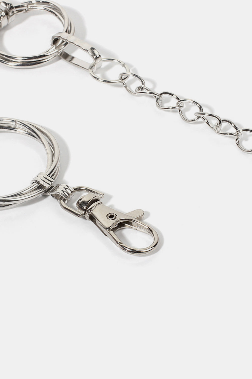 Silver linked circle waist chain with lobster clasp detail
