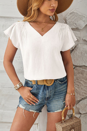 White textured v-neck blouse with pleated flutter sleeves