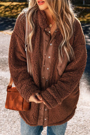Brown teddy textured utility jacket with button front and contrast panels.