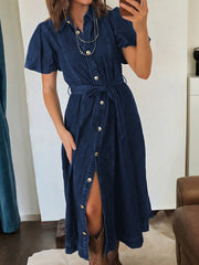 Button-down midi denim dress with puff sleeves, belt, and gold buttons.