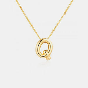 Gold initial Q charm necklace with beaded chain