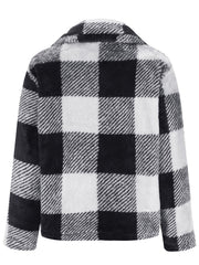 Fluffy black and white plaid zip-up shacket with collar.
