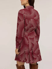 Red mini shirt dress with heart dot print, button front, and A-line skirt.
