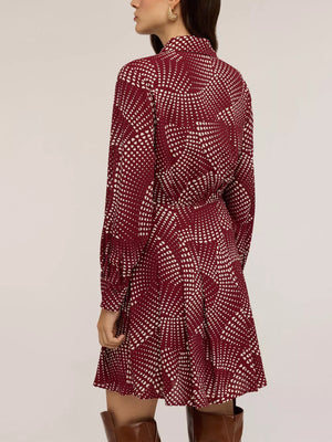 Red mini shirt dress with heart dot print, button front, and A-line skirt.