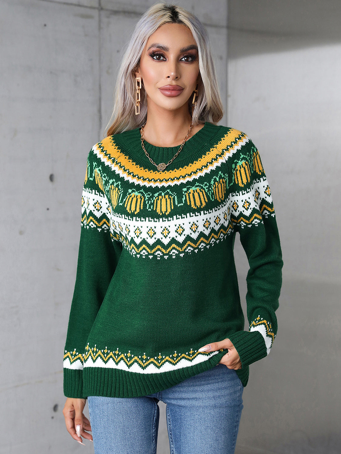 Dark green acrylic crewneck sweater with autumnal Fair Isle pattern and ribbed cuffs and hem.