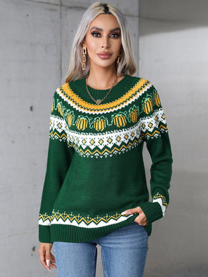 Dark green acrylic crewneck sweater with autumnal Fair Isle pattern and ribbed cuffs and hem.