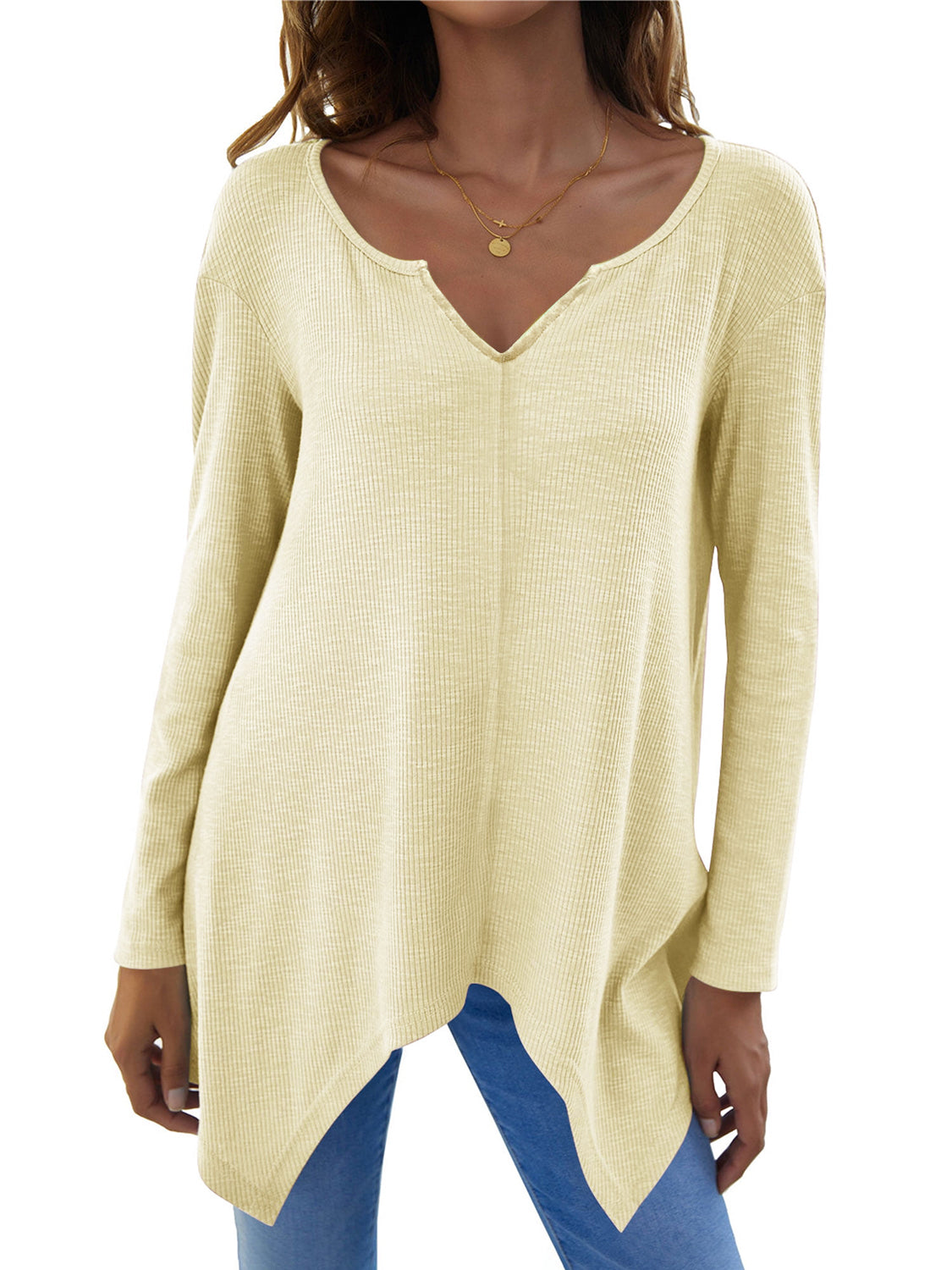 Light yellow ribbed knit tunic with v-neck and asymmetric hem