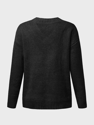 Black knit sweater with V-neck and ribbed trim detail.