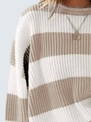 Striped oversized knit sweater in cream and tan with crewneck.