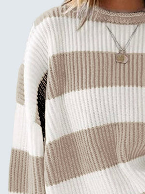 Striped oversized knit sweater in cream and tan with crewneck.